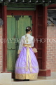 South Korea, SEOUL, Changdeokgung Palace, woman in Hanbok attire posing for photo, SK226JPL