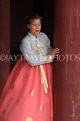 South Korea, SEOUL, Changdeokgung Palace, woman in Hanbok attire posing for photo, SK228JPL