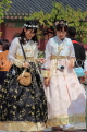 South Korea, SEOUL, Gyeongbokgung Palace, visitors in traditional Hanbok attire, SK464JPL