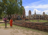 THAILAND, Ayuthaya, Wat Phra Mahathat, temple site ruins and monk, THA2044JPL