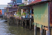 THAILAND, Bangkok, Chao Phraya River, riverside houses on stilts, THA3179JPL