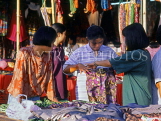 THAILAND, Bangkok, Chatuchak Weekend Market, shoppers at clothes stall, THA1809JPL