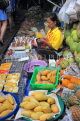THAILAND, Bangkok, Maeklong Railway Market, fruit stall and vendor, THA2937JPL