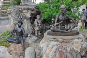 THAILAND, Bangkok, WAT PHO, statues spread throughout temple site, THA2893JPL