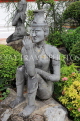 THAILAND, Bangkok, WAT PHO, stone statues spread throughout temple site, THA2873JPL