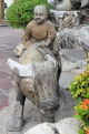 THAILAND, Bangkok, WAT PHO, stone statues spread throughout temple site, THA2881JPL