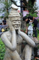 THAILAND, Bangkok, WAT PHO, stone statues spread throughout temple site, THA2883JPL