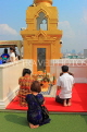 THAILAND, Bangkok, WAT SAKET (Golden Mount Temple), worshippers bya shrine, THA3329JPL