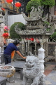 THAILAND, Bangkok, WAT SUTHAT, courtyard statues, and shrine, THA3217JPL