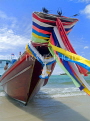 THAILAND, Koh Phangan Island, beach and longtail boat draped in good luck ribbons, THA2024JPL