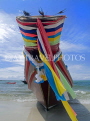 THAILAND, Koh Phangan Island, beach and longtail boat draped in good luck ribbons, THA2025JPL