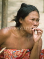 THAILAND, Koh Surin Island, Mokken sea gypsy woman smoking, THA1966JPL