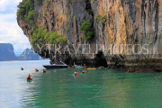 THAILAND, Phang Nga Bay, Panak Island, tourists exploring by sea canoe, THA4257JPL