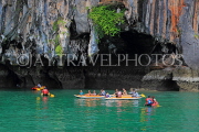 THAILAND, Phang Nga Bay, Panak Island, tourists exploring by sea canoe, THA4264JPL