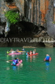 THAILAND, Phang Nga Bay, Panak Island, tourists exploring caves by sea canoe, THA4266JPL