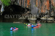 THAILAND, Phang Nga Bay, Panak Island, tourists exploring caves by sea canoe, THA4268JPL