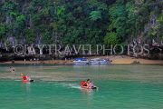 THAILAND, Phang Nga Bay, limestone islands, small beach, sea canoes,THA4340JPL