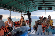 THAILAND, Phang Nga Bay, tourists on big boat tour, THA4331JPL