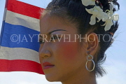 THAILAND, Surin, elephant festival, dancer with flag, THA2127JPL
