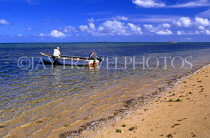 TONGA, Atata Island, beach and fisherman with small boat at sea, TON119JPL