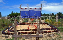 TONGA, Nukualofa, cemetery, typical burial mound decorated with beer bottles, TON173JPL