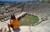 TURKEY, Aphrodisias, ancient theatre and tourist, TUR626JPL
