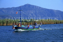 TURKEY, Dalyan Delta, tourists on boat trip along Dalyan River, TUR604JPL