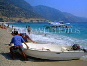 TURKEY, Fethiye area, Olu Deniz lagoon, beach and tourists with boat