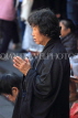Taiwan, TAIPEI, Lungshan Temple, worshipper praying, TAW665JPL