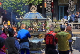 Taiwan, TAIPEI, Lungshan Temple, worshippers by incense burner censer, TAW669JPL