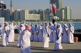 UAE, ABU DHABI, The Corniche, men performing a traditional cultural show, UAE692JPL