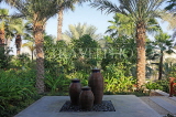 UAE, DUBAI, Madinat Jumeirah, landscaped gardens and pottery display, UAE504JPL