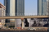 UAE, DUBAI, street with skyscrapers and ad hoarding, UAE702JPL