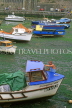 UK, Devon, BRIXHAM, harbourfront, man cleaning boat, DEV409JPL