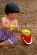 UK, Devon, PAIGNTON, child (toddler) on beach, playing with bucket and spade, DEV537JPL