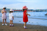 UK, Devon, PAIGNTON, three children (girls) on beach, DEV532JPL