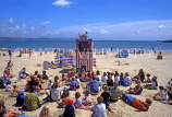UK, Dorset, WEYMOUTH, beach with holidaymakers watching 'Punch & Judy' show, UK5106JPL
