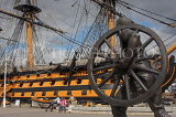 UK, Hampshire, PORTSMOUTH, Historic Dockyard, HMS Victory and bronze field gun statue, UK6574JPL