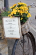 UK, Oxfordshire, OXFORD, bicycle with floral basket, advertising cafe menu, UK13086JPL