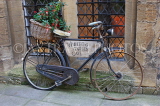 UK, Oxfordshire, OXFORD, bicycle with floral basket advertising a cafe, UK13146JPL
