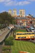 UK, Yorkshire, YORK, City Walls, York Minster in background, and tour bus, UK3136JPL