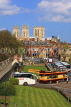 UK, Yorkshire, YORK, City Walls, York Minster in background, and tour bus, UK3137JPL