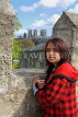 UK, Yorkshire, YORK, City Walls, York Minster in background, teenager posing, UK9855JPL