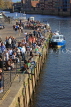 UK, Yorkshire, YORK, people enjoying sunny evening by riverside, UK3087JPL
