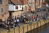 UK, Yorkshire, YORK, people enjoying sunny evening by riverside and Kings Arms Pub, UK3084JPL