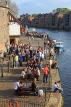 UK, Yorkshire, YORK, people enjoying sunny evening by riverside and Kings Arms Pub, UK3088JPL
