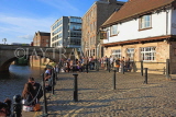 UK, Yorkshire, YORK, people enjoying sunny evening by riverside and Kings Arms Pub, UK3089JPL