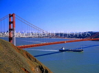 USA, California, SAN FRANCISCO, Golden Gate Bridge, and cargo ship passing under, US3470JPL