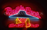 USA, Florida, MIAMI, South Beach, neon lit surf shop sign, MIA809JPL