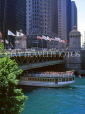 USA, Illinois, CHICAGO, pleasure boat passing under Michigan Avenue Bridge, US2667JPL